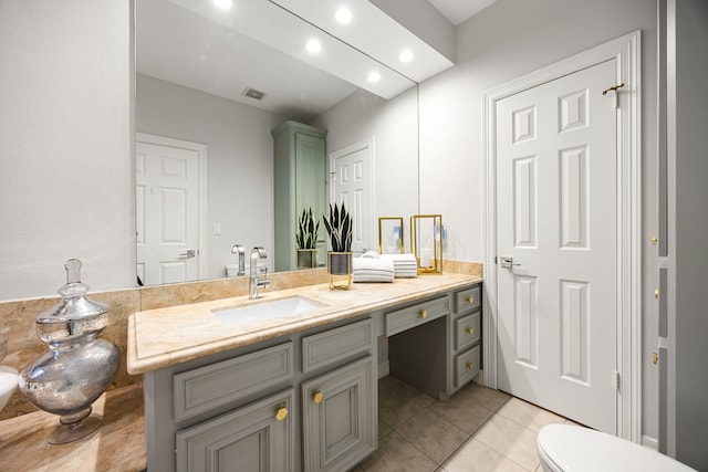 bathroom featuring visible vents, toilet, recessed lighting, tile patterned flooring, and vanity