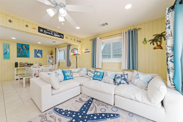 living area featuring tile patterned floors, visible vents, ceiling fan, and recessed lighting