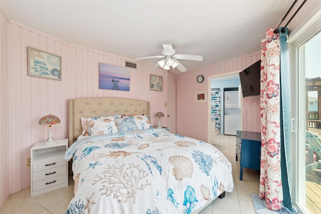 bedroom featuring tile patterned floors, visible vents, and ceiling fan