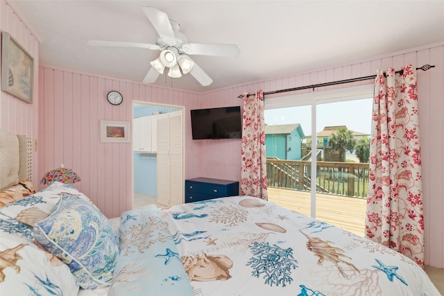 bedroom with ceiling fan and access to outside