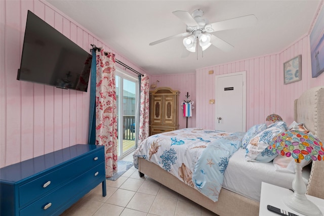 bedroom with light tile patterned floors, access to exterior, and a ceiling fan