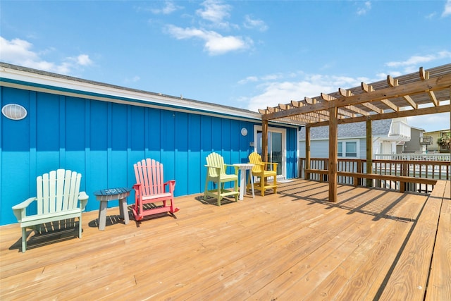 wooden terrace with a pergola