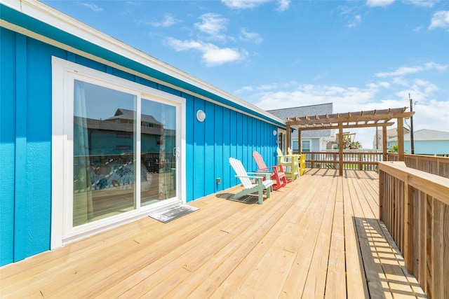 wooden deck featuring a pergola