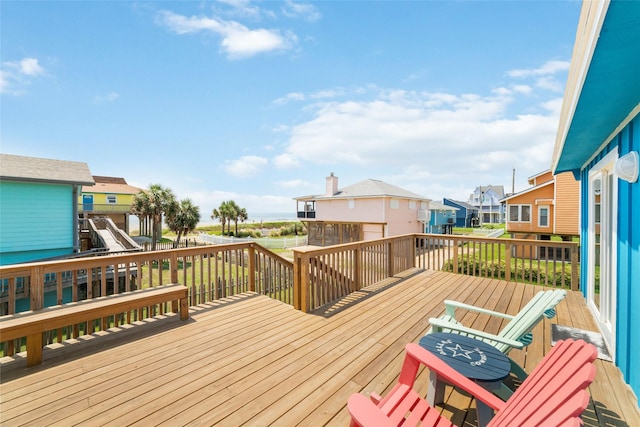 wooden deck with a residential view