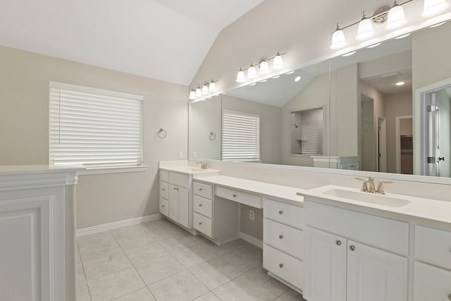 full bathroom with a sink, lofted ceiling, double vanity, and tile patterned floors