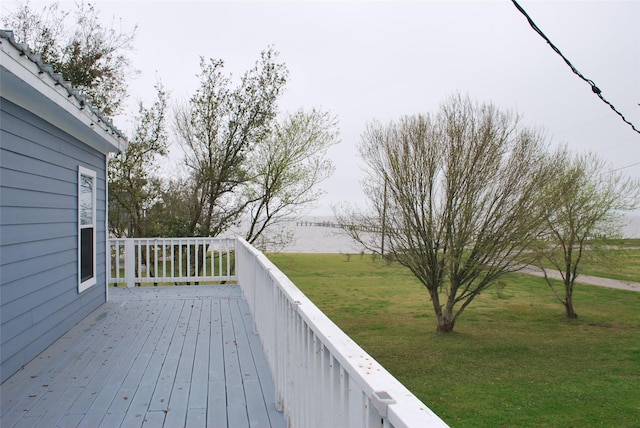 deck featuring a yard