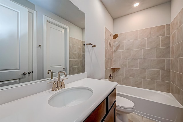 bathroom with vanity, toilet, bathtub / shower combination, and recessed lighting