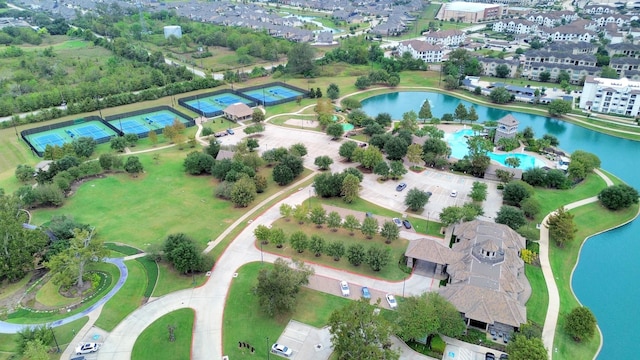 bird's eye view with a water view