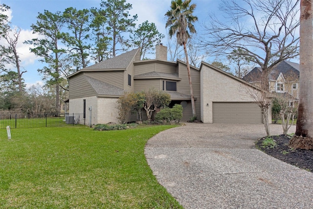 view of front of property featuring cooling unit, a front yard, brick siding, and driveway