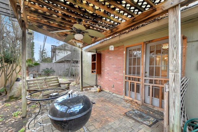 view of patio featuring fence