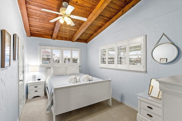 bedroom with ceiling fan, vaulted ceiling with beams, wood ceiling, and light carpet