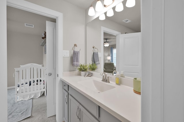 bathroom featuring visible vents and vanity