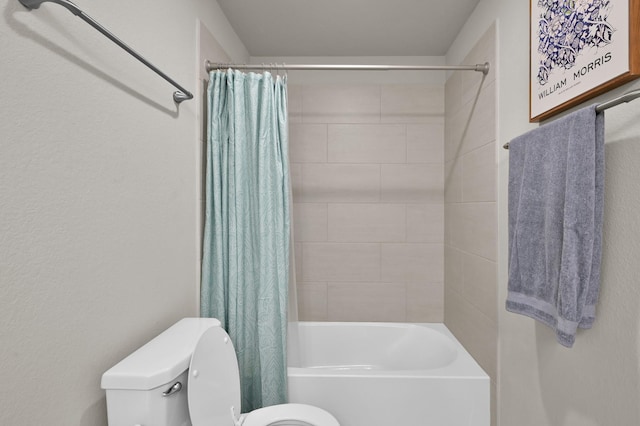 bathroom with toilet and shower / tub combo with curtain