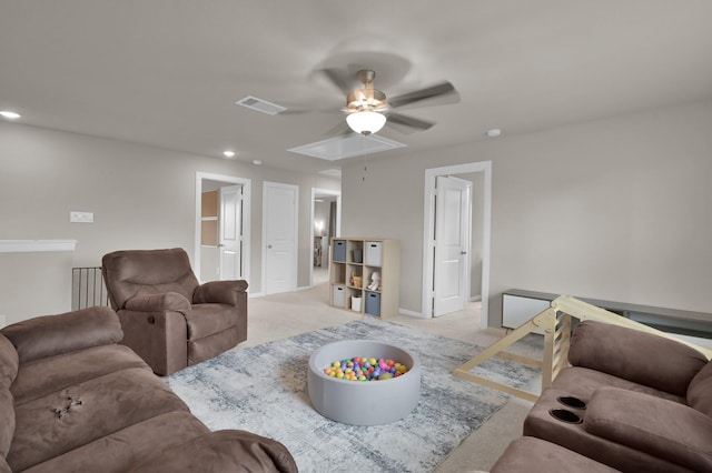 living area featuring baseboards, visible vents, attic access, recessed lighting, and carpet flooring