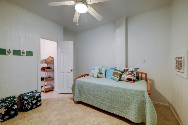 bedroom with ceiling fan and ornamental molding