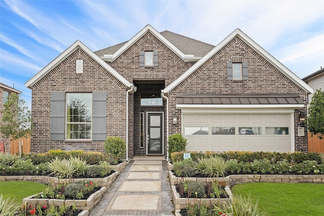 view of front of house featuring a garage, brick siding, and a shingled roof