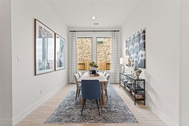 dining room featuring visible vents, recessed lighting, baseboards, and light wood-type flooring