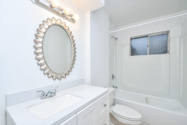 bathroom featuring vanity, shower / tub combination, and toilet