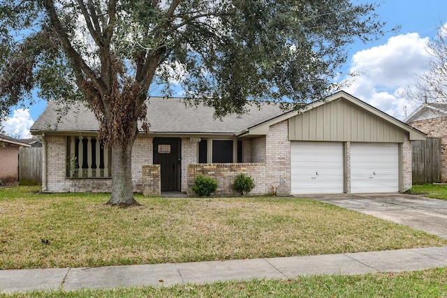 single story home featuring driveway, a front lawn, roof with shingles, an attached garage, and brick siding