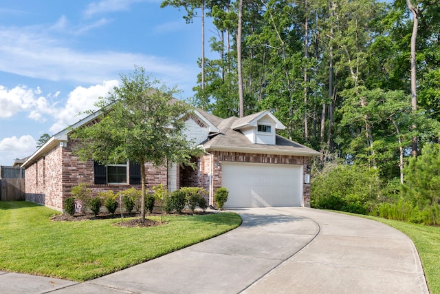 view of front of home with brick siding, a garage, driveway, and a front lawn