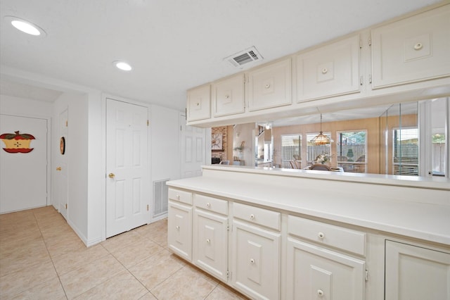 3130 Glade Springs Dr, Houston, TX 77339 - kitchen with light tile patterned floors, visible vents, recessed lighting, and light countertops