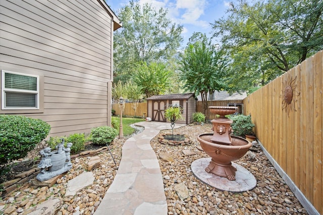 3130 Glade Springs Dr, Houston, TX 77339 - view of yard with a storage unit, an outbuilding, and a fenced backyard