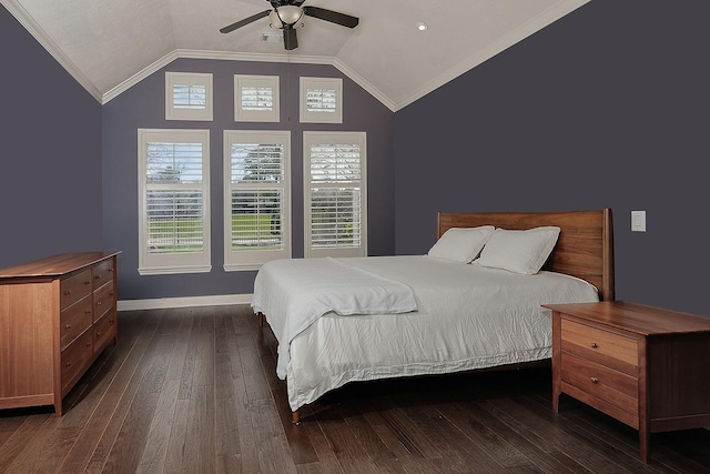 bedroom featuring ornamental molding, hardwood / wood-style floors, baseboards, and vaulted ceiling