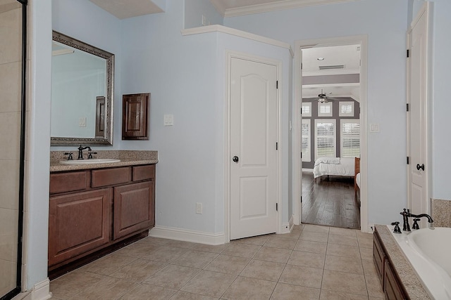 full bathroom with tile patterned floors, ornamental molding, a ceiling fan, connected bathroom, and vanity