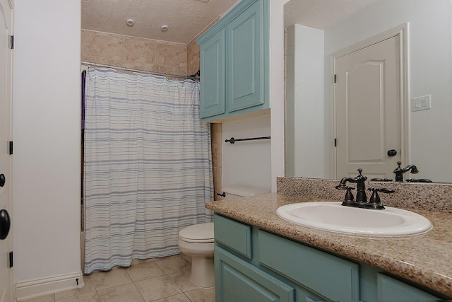 bathroom featuring tile patterned floors, a shower with curtain, toilet, a textured ceiling, and vanity