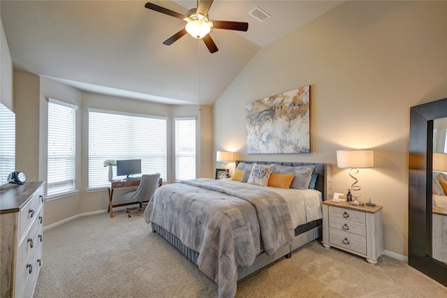 bedroom featuring baseboards, visible vents, light carpet, and lofted ceiling