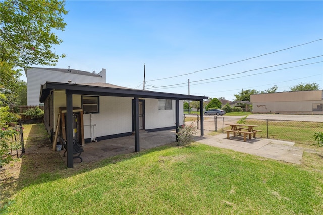 view of yard with a patio and fence