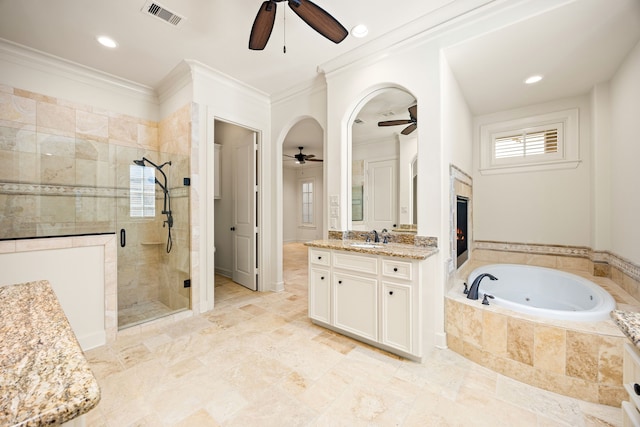 bathroom featuring a shower stall, visible vents, a whirlpool tub, and ornamental molding