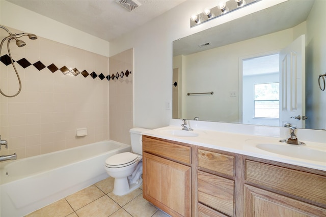 full bathroom with a sink, visible vents, and tile patterned floors