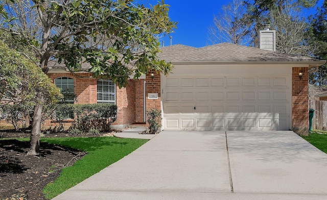 single story home with driveway, roof with shingles, a garage, brick siding, and a chimney