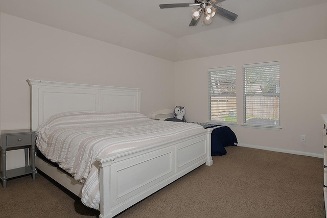 bedroom featuring dark carpet, baseboards, and ceiling fan