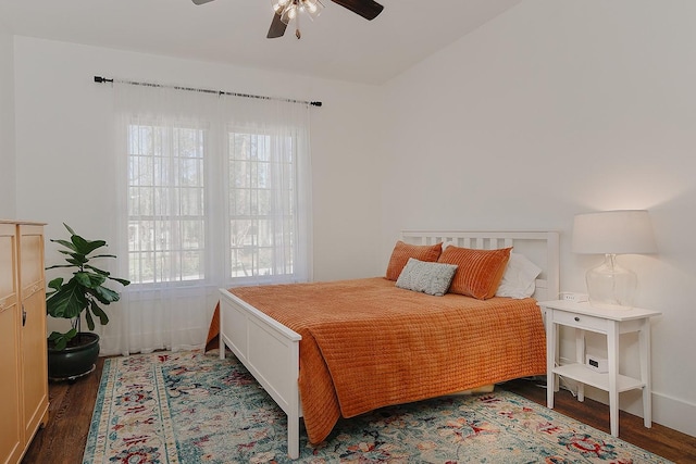 bedroom with wood finished floors and a ceiling fan