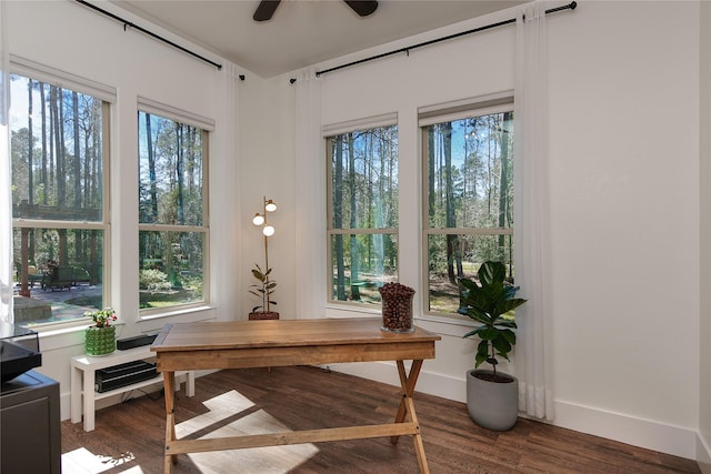 home office with wood finished floors, baseboards, and ceiling fan