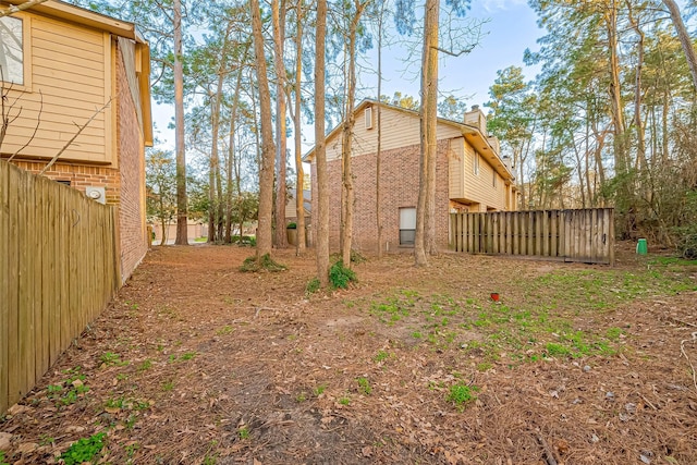 view of yard featuring fence