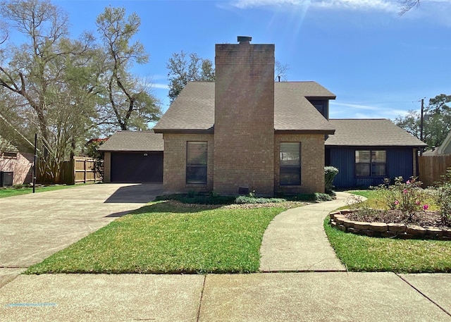 view of front of house with fence, brick siding, driveway, and a chimney