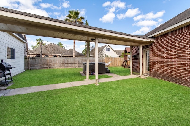 view of yard with cooling unit and a fenced backyard