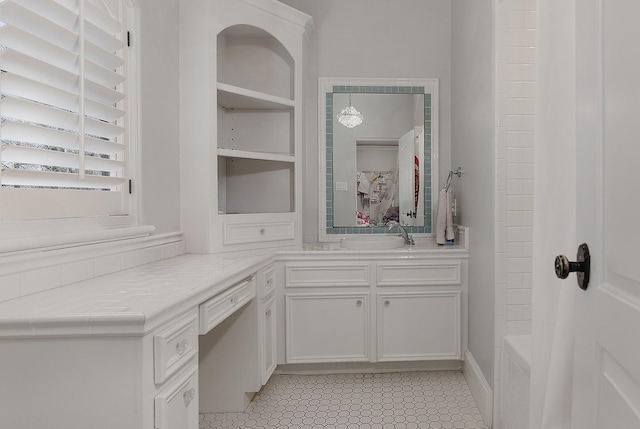 bathroom featuring vanity and walk in shower