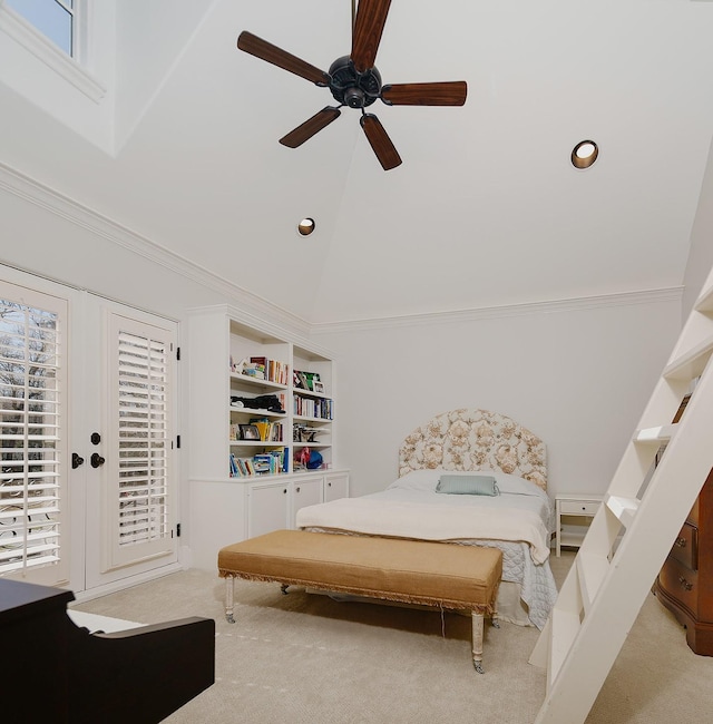 carpeted bedroom with multiple windows, high vaulted ceiling, and access to outside