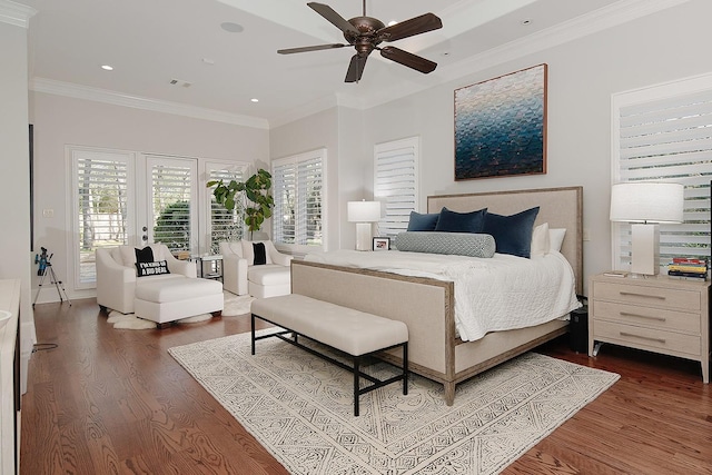 bedroom with access to outside, visible vents, crown molding, and wood finished floors