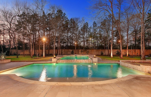 view of swimming pool featuring a fenced in pool, a patio, an in ground hot tub, and a fenced backyard