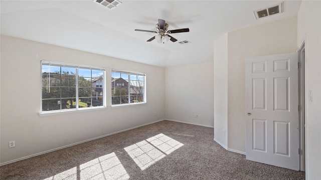 unfurnished room with visible vents, ceiling fan, baseboards, and carpet floors