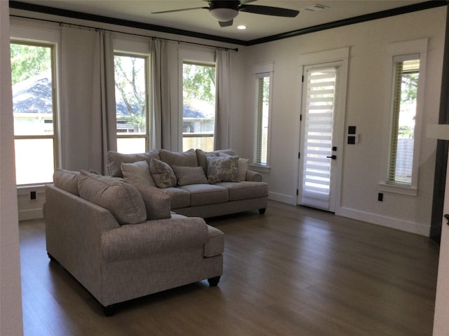 living area featuring wood finished floors, recessed lighting, crown molding, baseboards, and ceiling fan