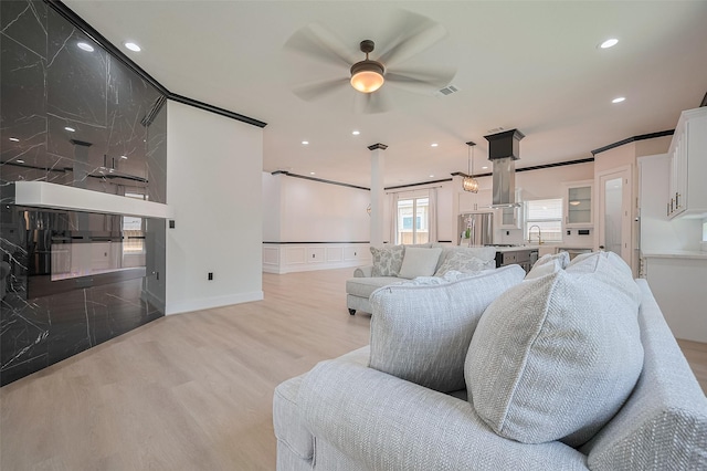 11706 Walden Rd, Montgomery, TX 77356 - living room featuring recessed lighting, a ceiling fan, wood finished floors, and visible vents