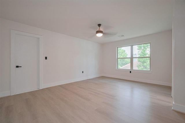 11706 Walden Rd, Montgomery, TX 77356 - unfurnished room featuring baseboards, ceiling fan, light wood-style flooring, and visible vents
