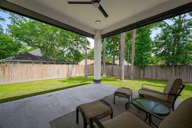 11706 Walden Rd, Montgomery, TX 77356 - view of patio with a ceiling fan and a fenced backyard