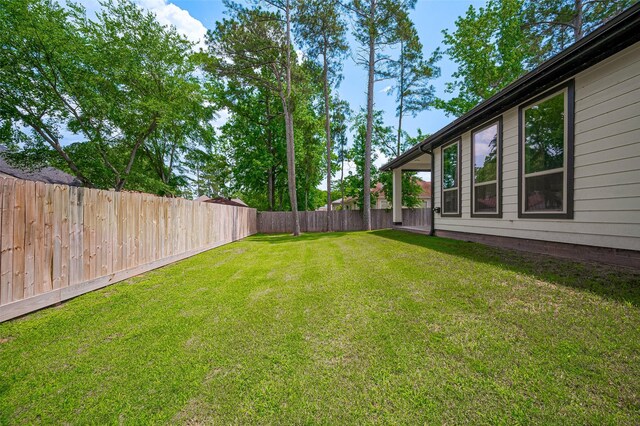 11706 Walden Rd, Montgomery, TX 77356 - view of yard featuring a fenced backyard
